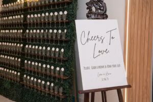Wedding champagne welcome wall and sign at Oasis Convention Centre