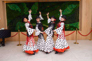 Flamenco dancers performing at a social event at Oasis Convention Centre
